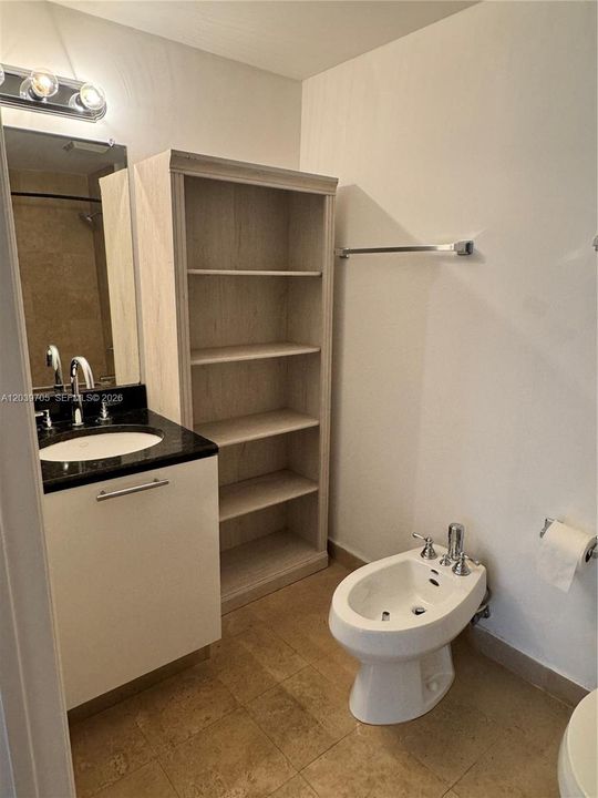 En suite bathroom bidet and sink