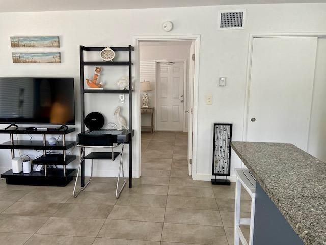 FRONT DOOR TO BEDROOM