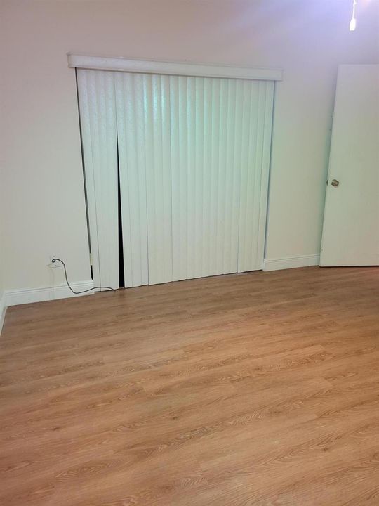 3rd bedroom with slider to porch