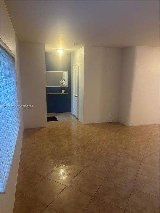Foyer, Door to Laundry and Living Room.