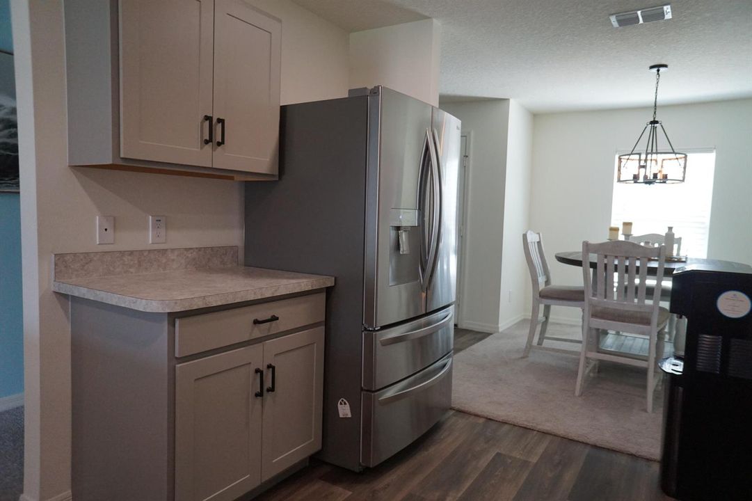 Kitchen view into dining