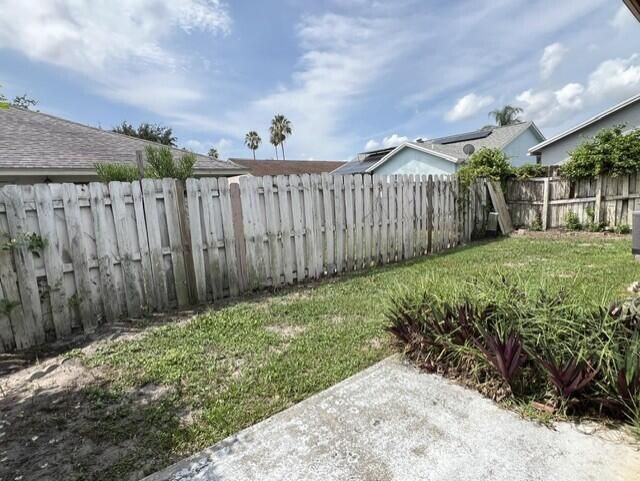 13-Fenced back yard
