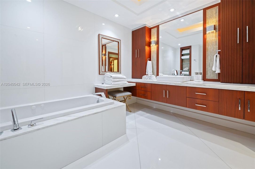 Spacious soaking tub and designer finishes.