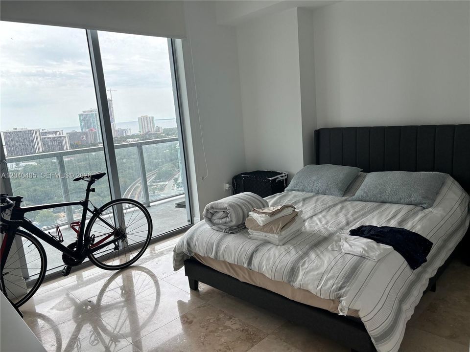 Second bedroom with plenty of space, bay view  and a walking closet