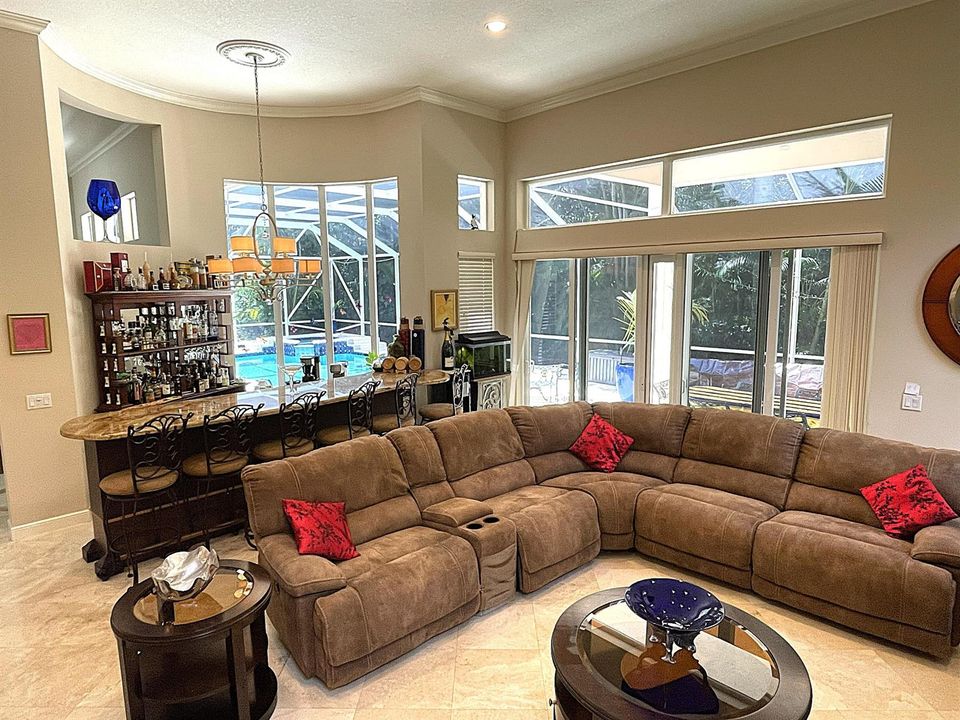 Living Room and Bar over Looking Pool