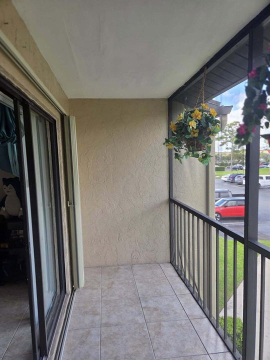 Screened, Covered Balcony