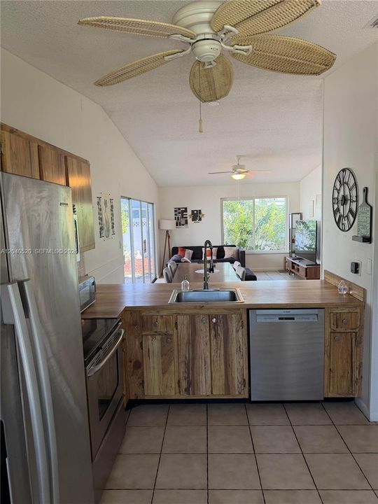 KITCHEN OPEN TO LIVING ROOM