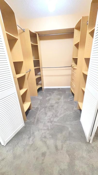 Primary Walk-inCloset w: built-ins