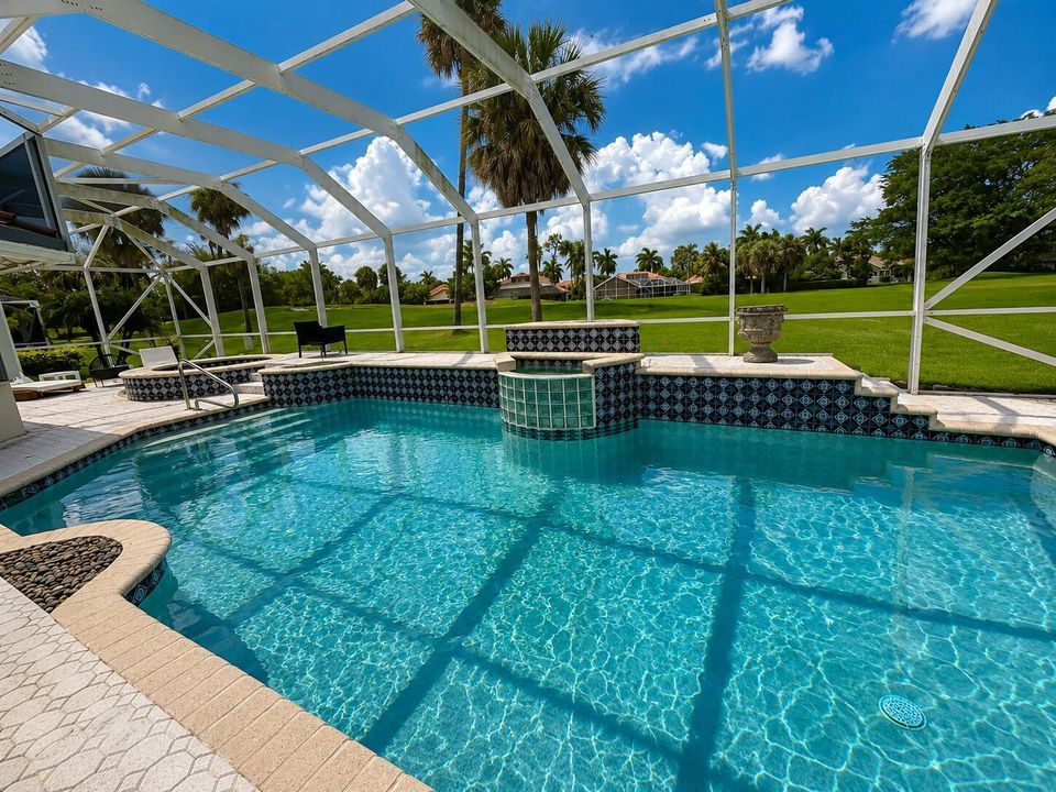 Pool waterfall and separate spa