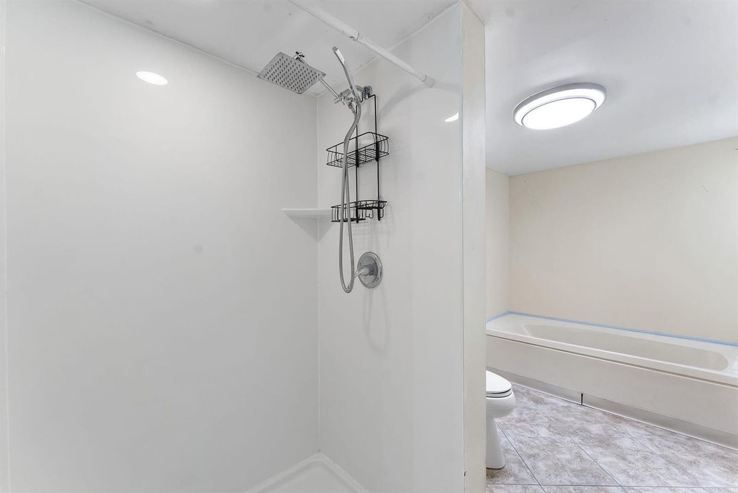 standing shower and tub