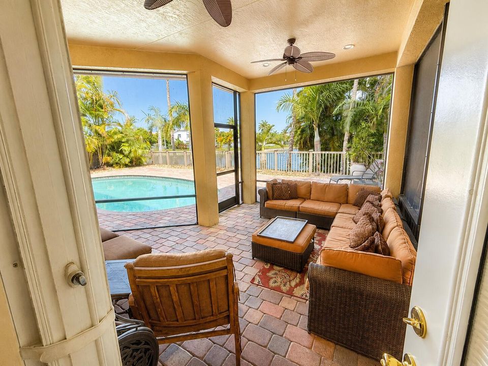 Covered Back Patio Area overlooking pool