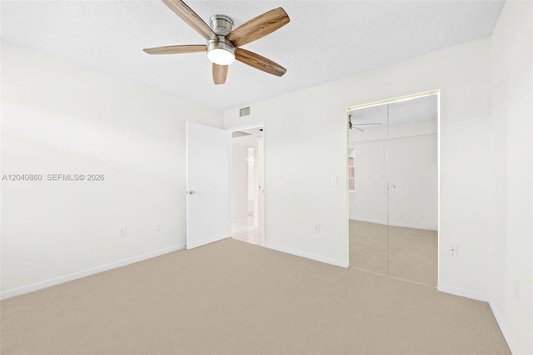 Guest room with walk in closet