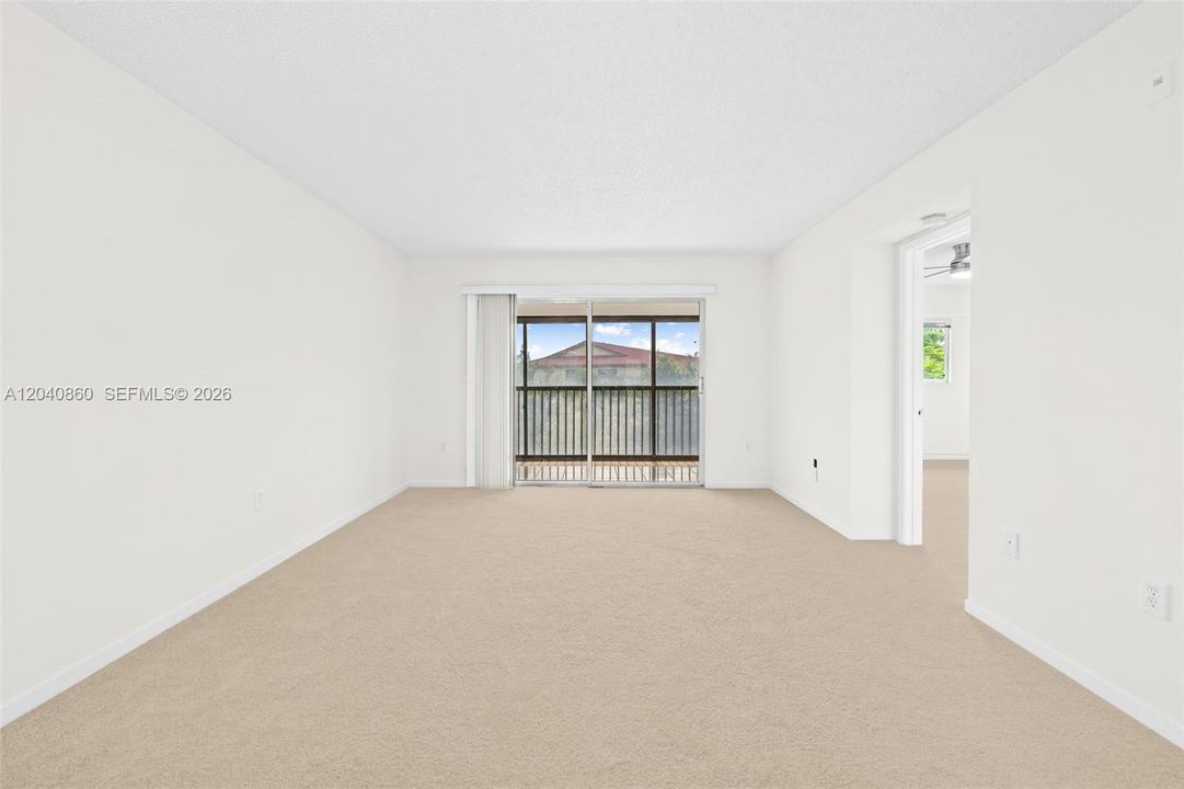 Living/ Dining. Freshly painted with new carpet.
