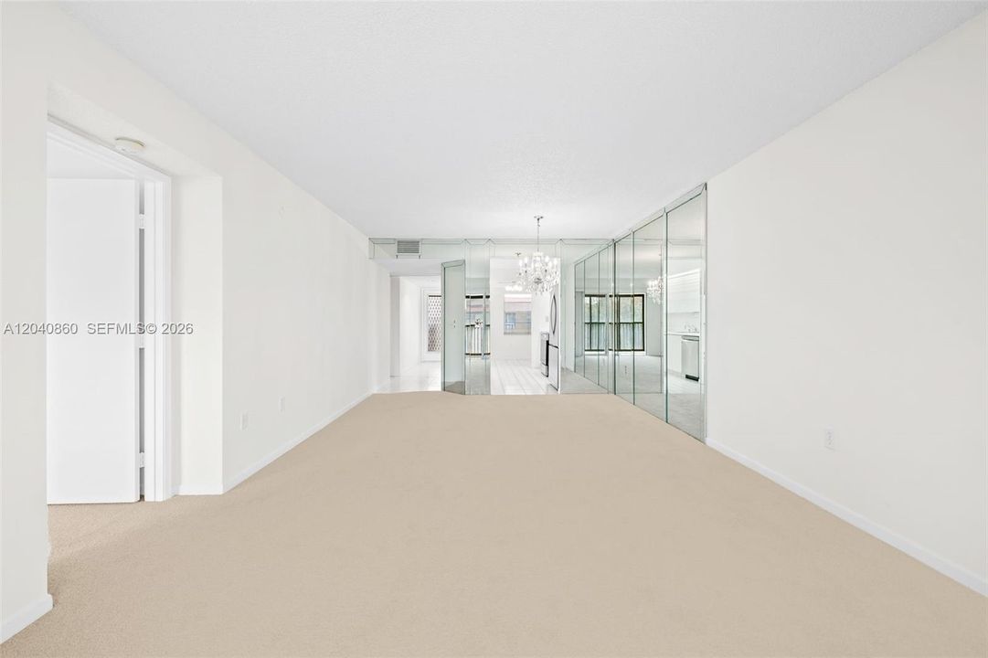 Living/ Dining. Freshly painted with new carpet.