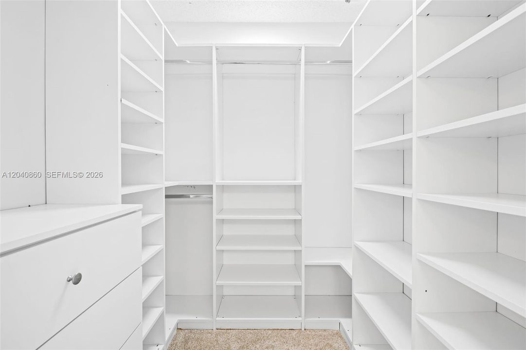 Guest closet with custom cabinetry