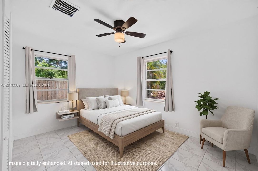 On of the guest bedrooms toward front of house. Overlooks front yard and side yard. Image digitally enhanced. AI used for staging purposes