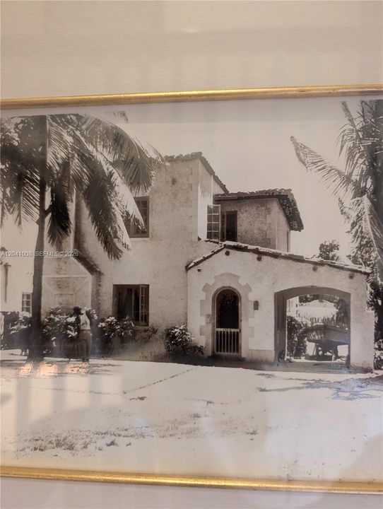 Don't know when, but the Palm tree is pretty high,so maybe this picture is from the 40's. If you look real closely to the left of the front door and window, there is a person with a cane standing under that coconut tree!