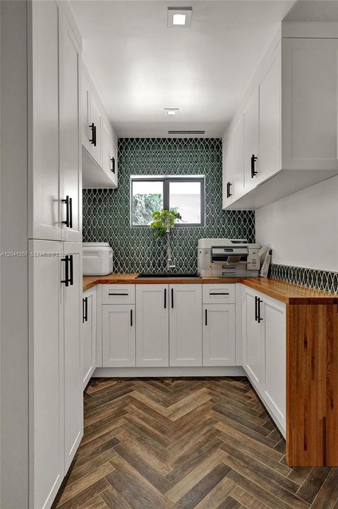 Pantry with extra sink and storage
