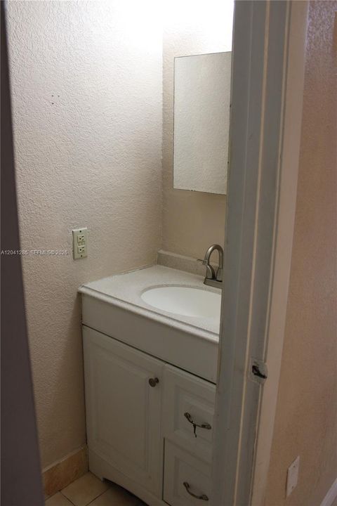 HALF BATHROOM DOWNSTAIRS