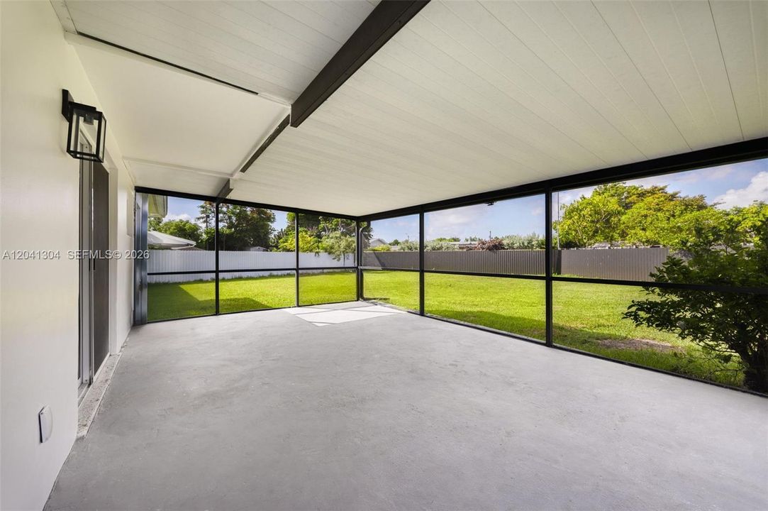 Screened Patio – Covered and screened patio creates a comfortable outdoor living area with easy access to the backyard. An ideal setting for morning coffee or evening relaxation.