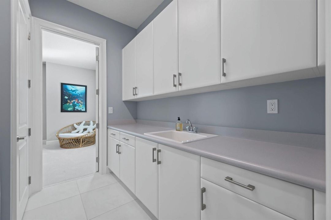 Laundry Room - abundant cabinets
