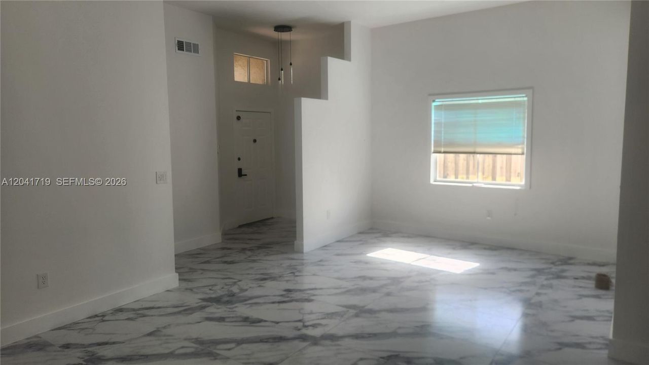 large living room view front enterance
