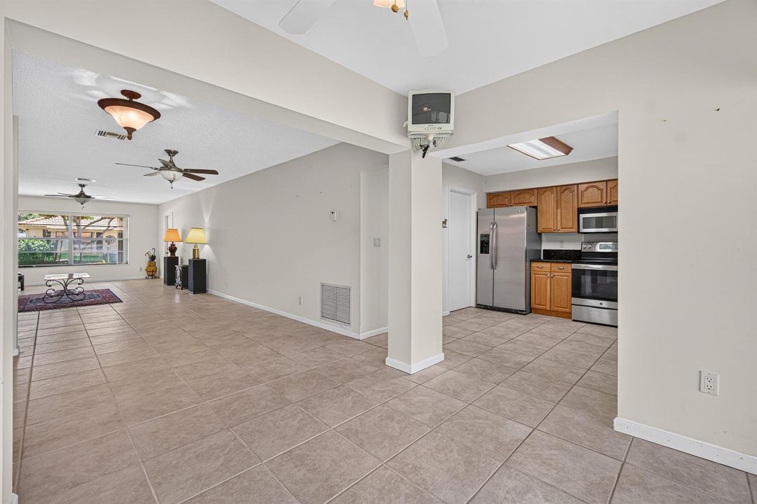 FLORIDA ROOM TO KITCHEN AND DINING ROOM