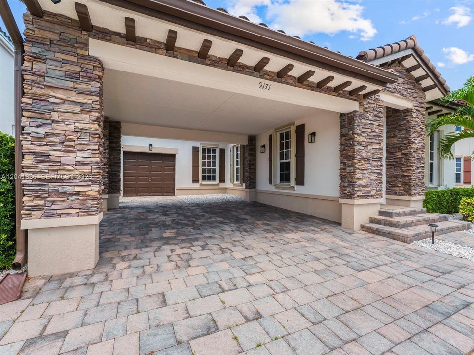 Wonderful Carport, parks four vehicles.