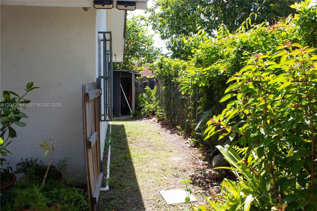 This is the access to the backyard from the right side of the home