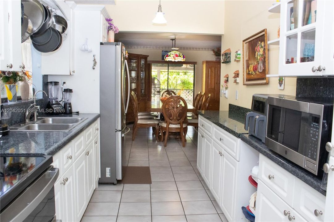 This is the kitchen. Photo taken from the door that leads to the Laundry Area.