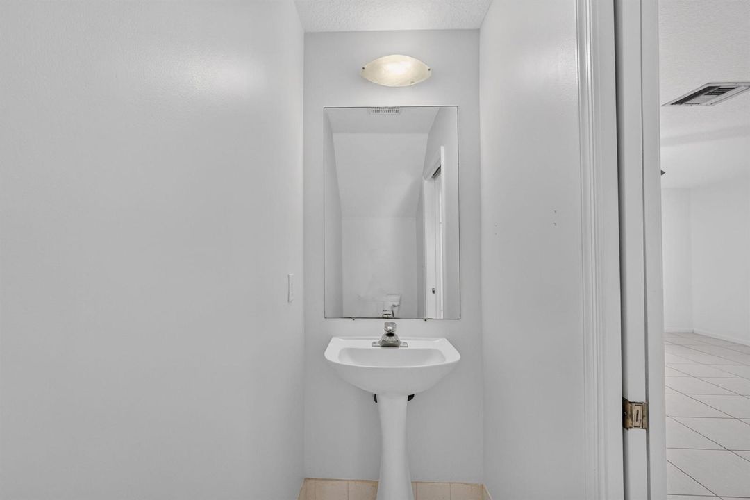 3RD BATHROOM HALF BATH DOWNSTAIRS