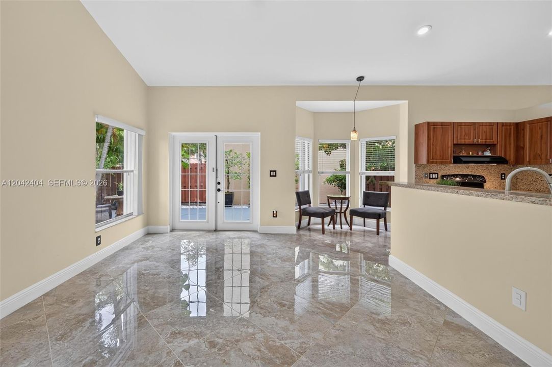 French doors lead to tranquil patio area.