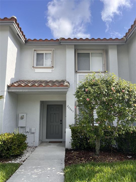Front of townhome with 2 parking spaces right in front!