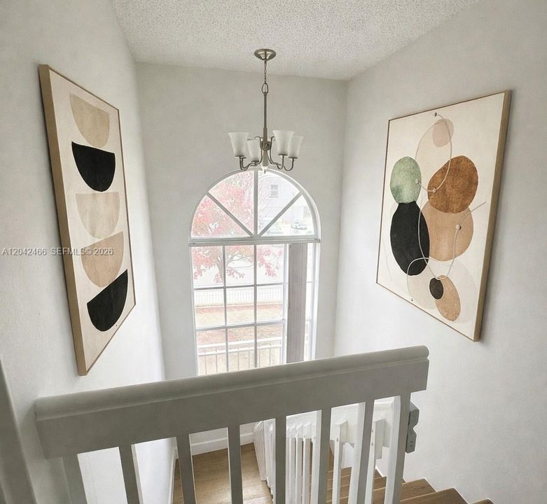 Stairs virtually staged for illustration purpose only