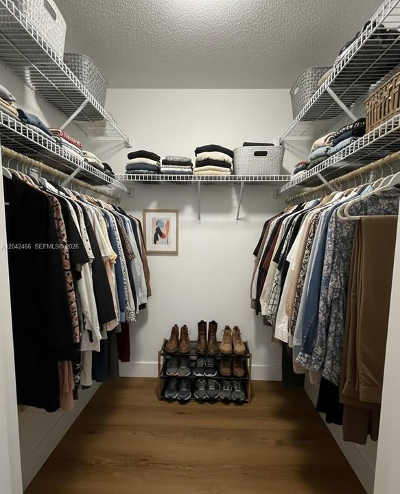 Walking closet bedroom virtually staged for illustration purpose only
