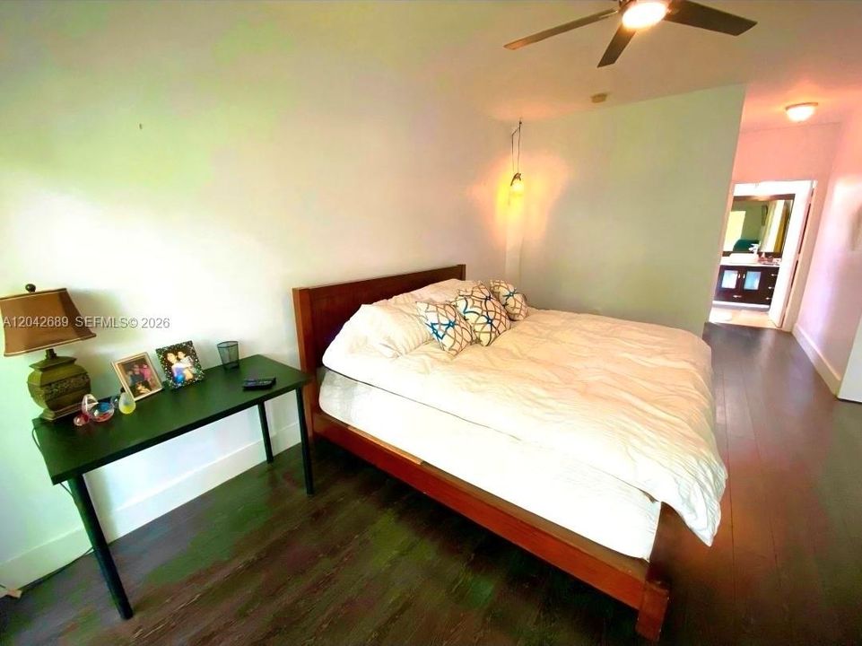 Primary Bedroom w Balcony over Garden