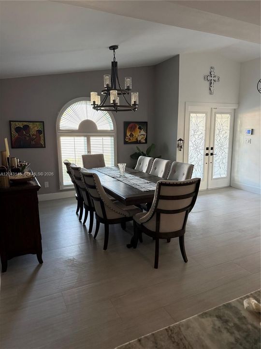 View of dining room area and house entrance.