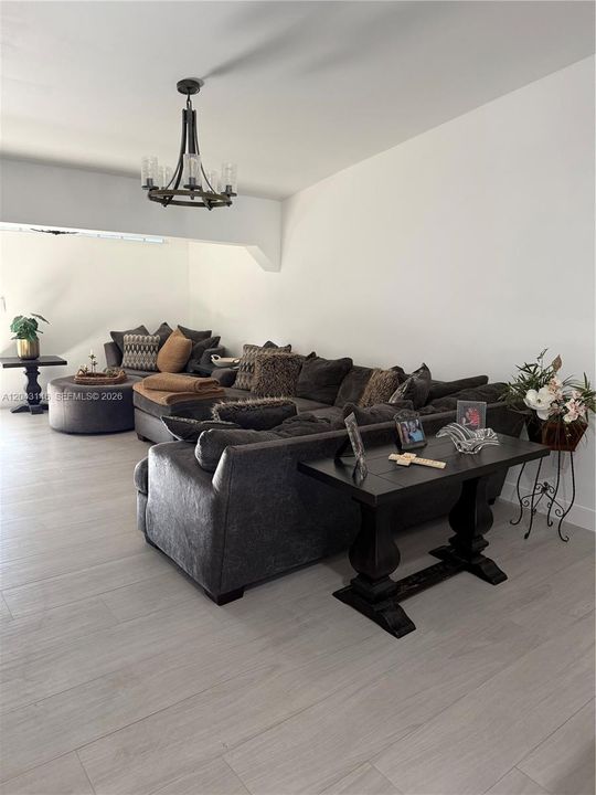 Spacious great room with seating for up to 10 people.