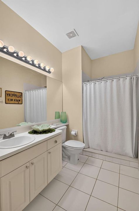 Primary bath with step in shower
