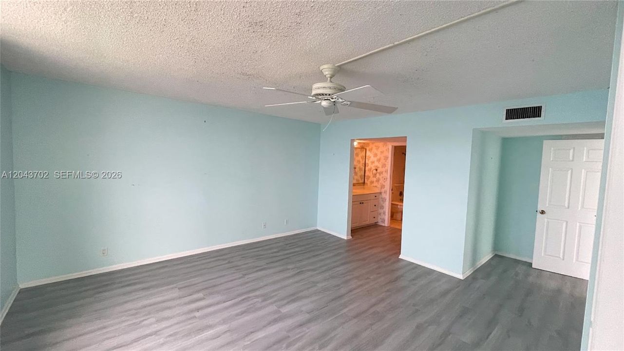 Primary bedroom. Enhanced photo.