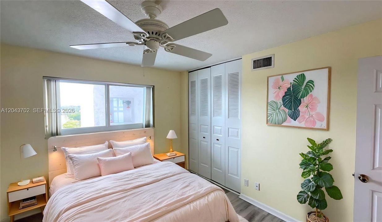 Second bedroom. Enhanced photo. Virtually staged photo.