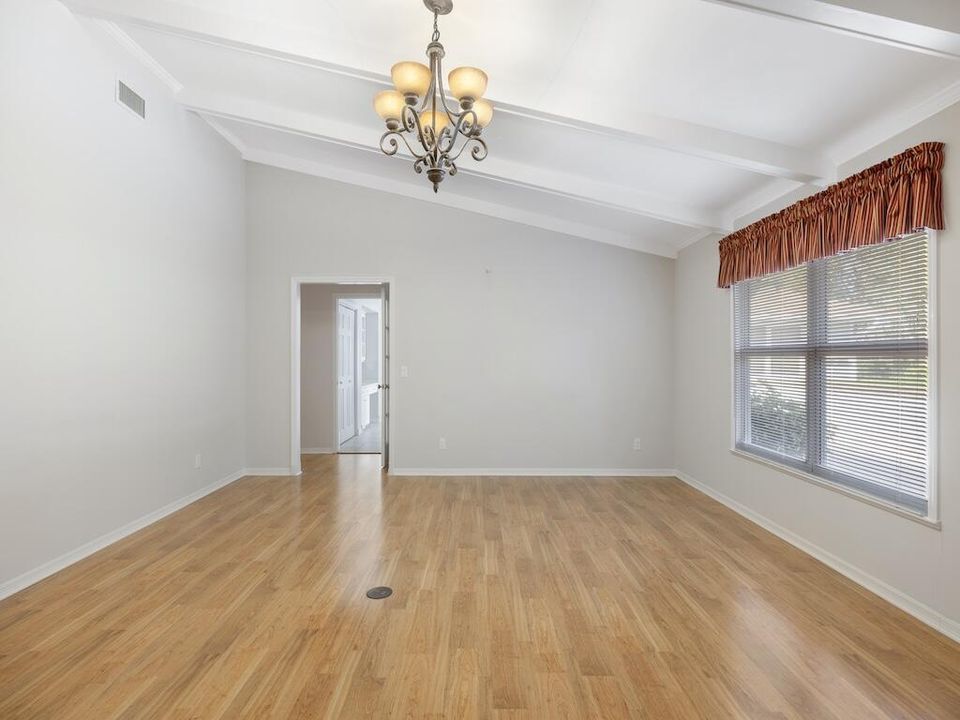 Living room with vaulted ceilings