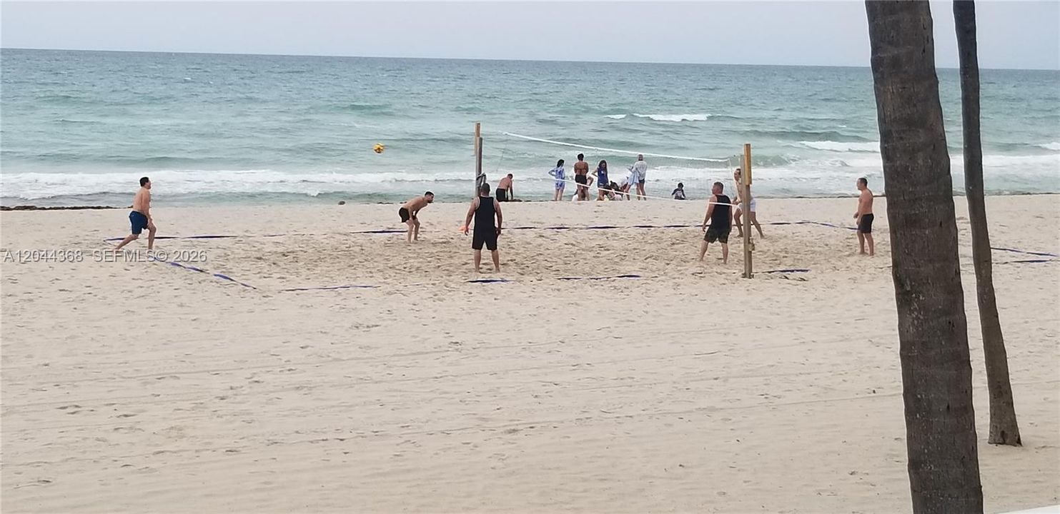 play vollyball at the beach