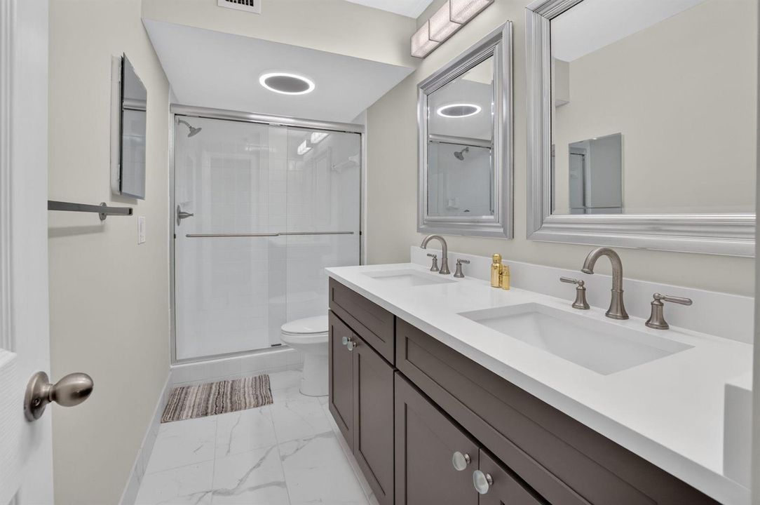 Primary Bathroom with Dual Vanities