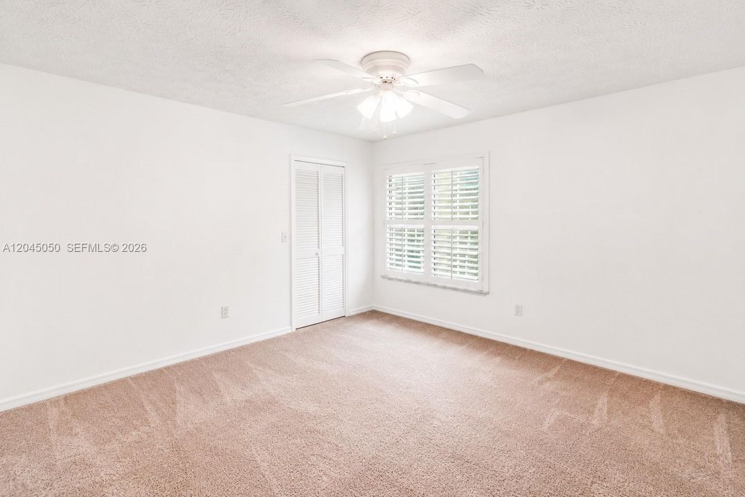 2nd Bedroom/ Plantation shutters and large closet