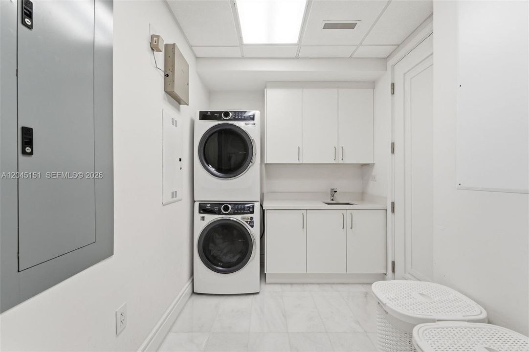 Laundry room with washer and dryer