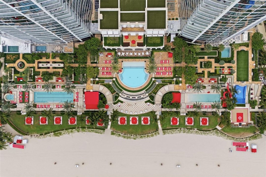 Aerial view of the pools , kids slide and wave stimulator