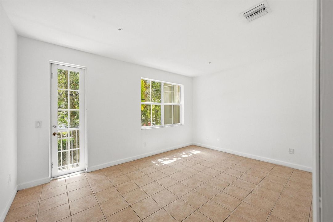 Bedroom w/ covered balcony