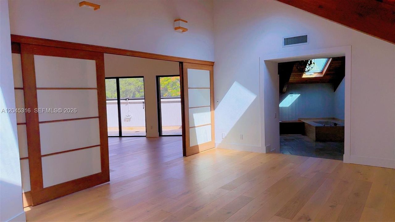 View to sitting/bonus area and master bath