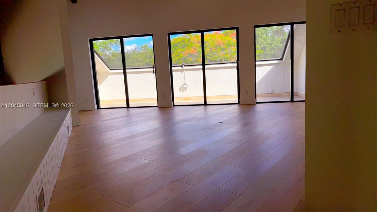 View looking into enclosed balcony. Can be master bedroom bonus room